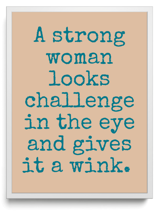 A strong woman looks challenge in the eye and gives it a wink framed typographic print